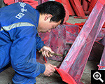 Bonding rubber liners